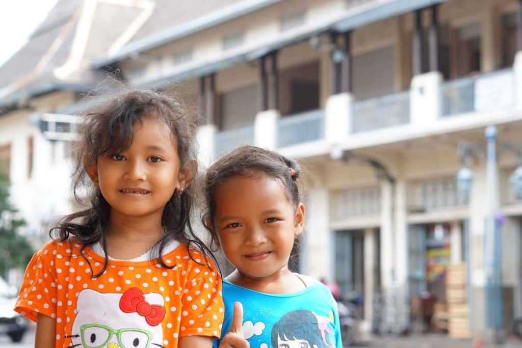Students In Front Of Their School